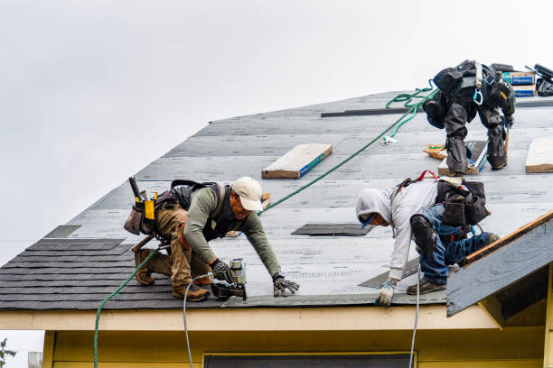 Professional Gutter Installation technician working in Kensal, ND